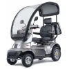 TGA Breeze S4 fitted with Solid Canopy in TGA Breeze S4 Mobility Scooter in Bright Silver Metallic