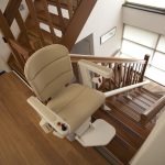 Handicare Freecurve Elegance upstairs with a curved stairlift