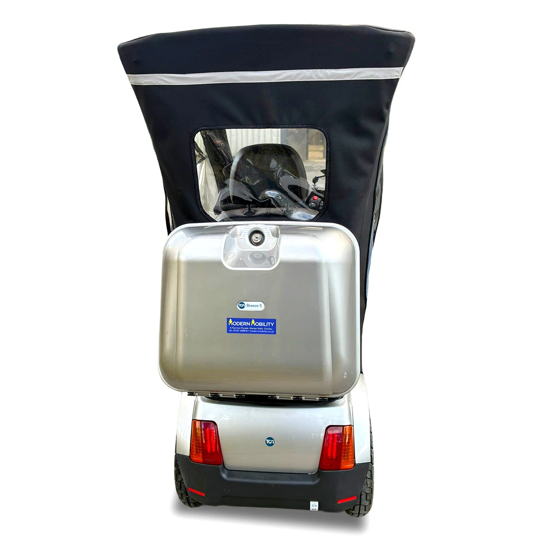 TGA Breeze S4 fitted with Solid Canopy in TGA Breeze S4 Mobility Scooter in Bright Silver