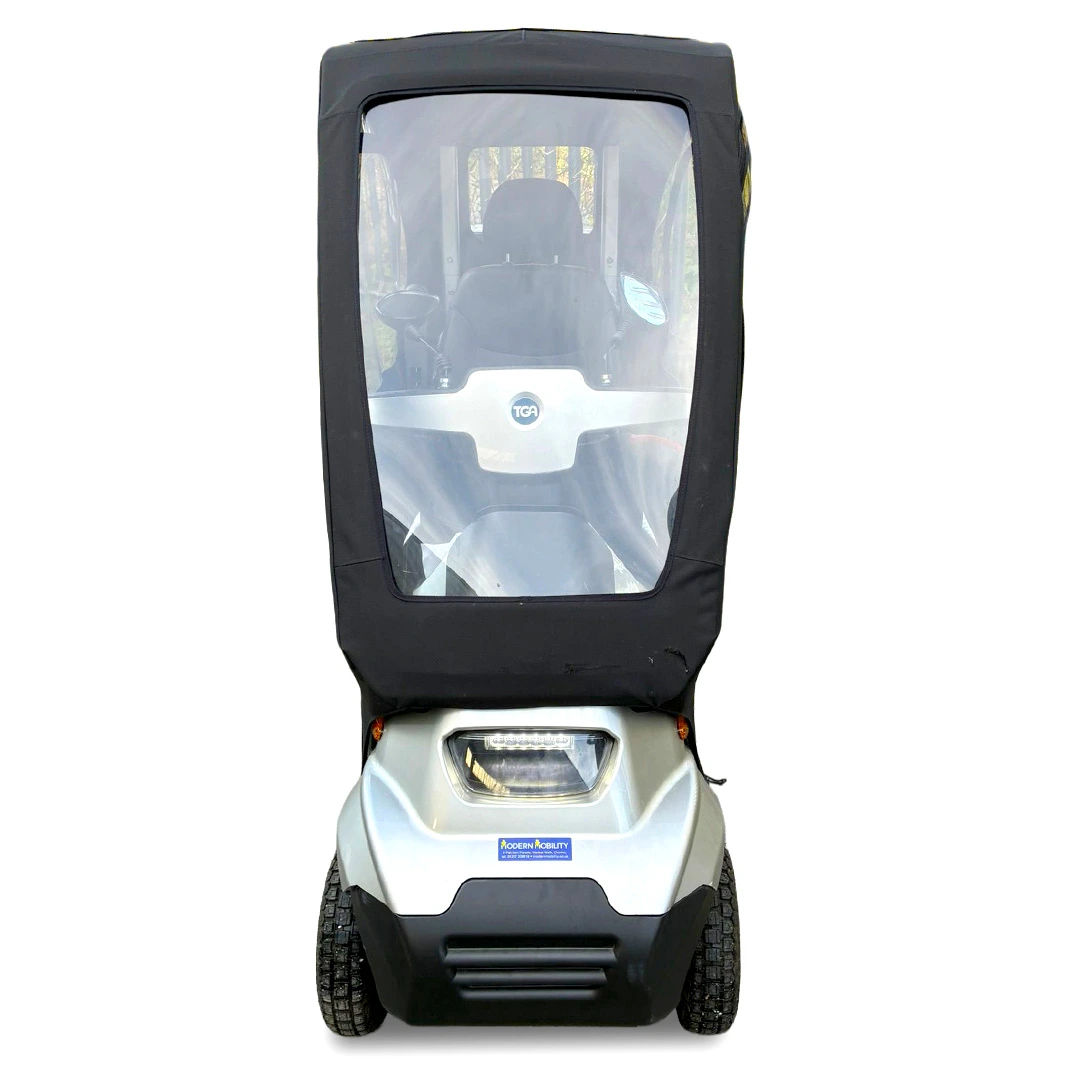 TGA Breeze S4 fitted with Solid Canopy in TGA Breeze S4 Mobility Scooter in Bright Silver